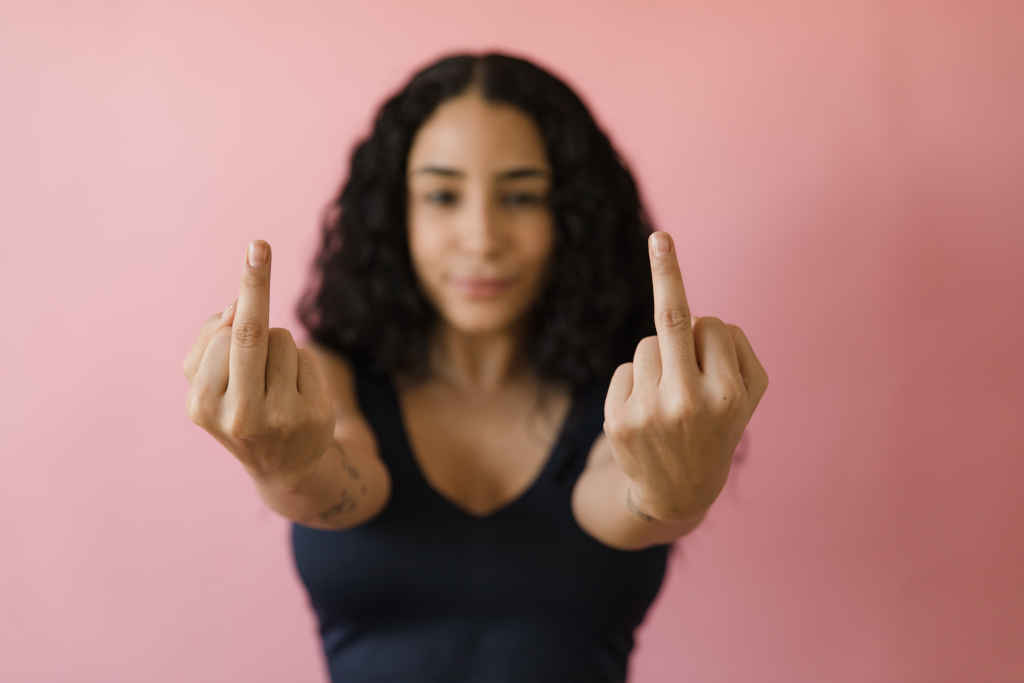Woman showing the finger - Photo by RODNAE Productions on pexels